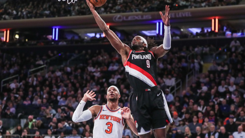 Portland Trail Blazers forward Jerami Grant (9) drives past New York Knicks guard Josh Hart (3) for a layup in the second quarter at Madison Square Garden