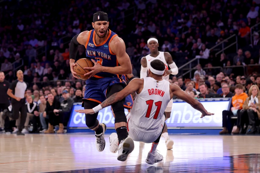 New York Knicks guard Josh Hart (3) is fouled as he drives to the basket by Toronto Raptors forward Bruce Brown (11) during the second quarter at Madison Square Garden