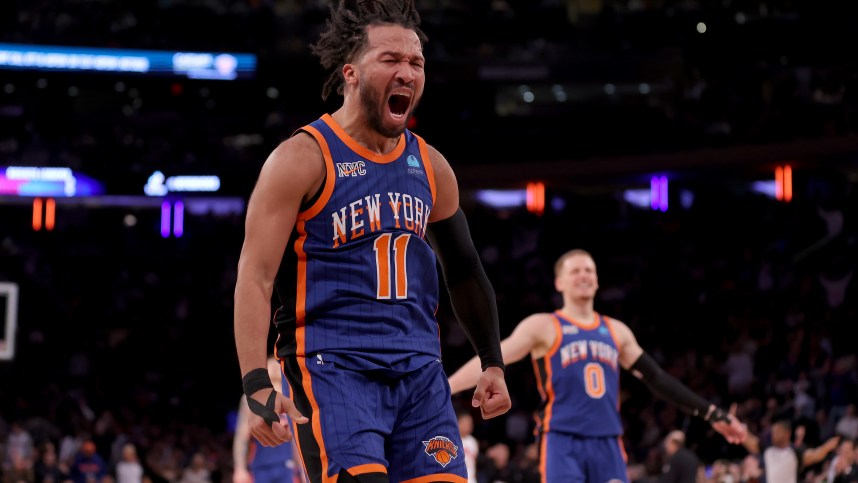 New York Knicks guard Jalen Brunson (11) celebrates his three point shot against the Toronto Raptors during the third quarter at Madison Square Garden