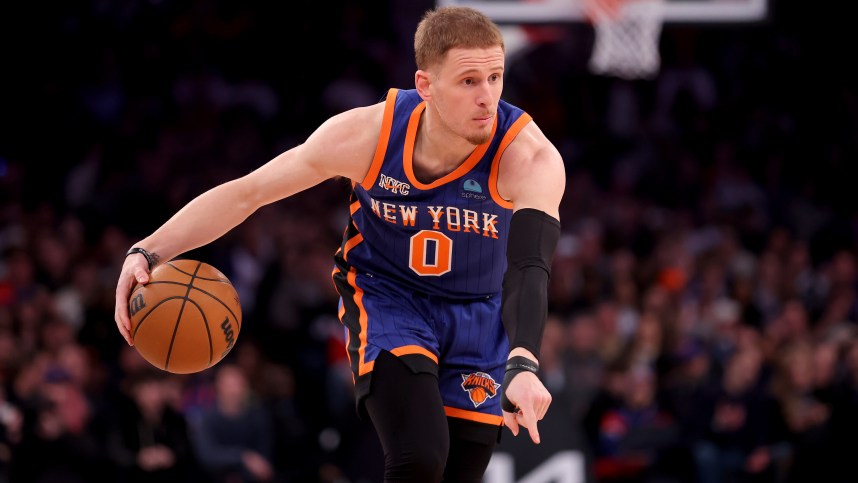 New York Knicks guard Donte DiVincenzo (0) controls the ball against the Toronto Raptors during the second quarter at Madison Square Garden
