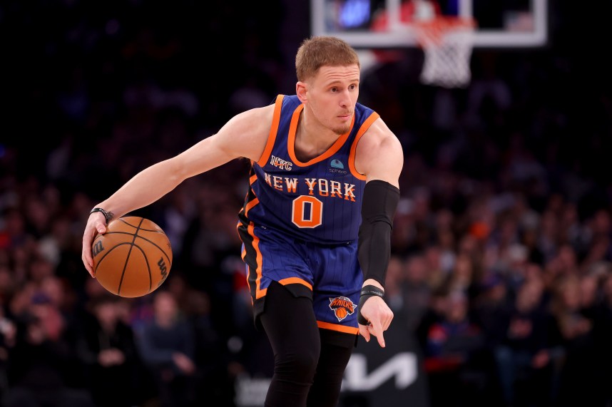 New York Knicks guard Donte DiVincenzo (0) controls the ball against the Toronto Raptors during the second quarter at Madison Square Garden