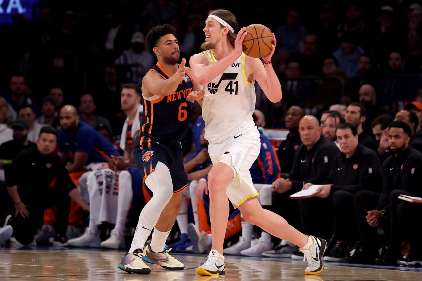 Utah Jazz forward Kelly Olynyk (41) controls the ball against New York Knicks guard Quentin Grimes (6) during the first quarter at Madison Square Garden