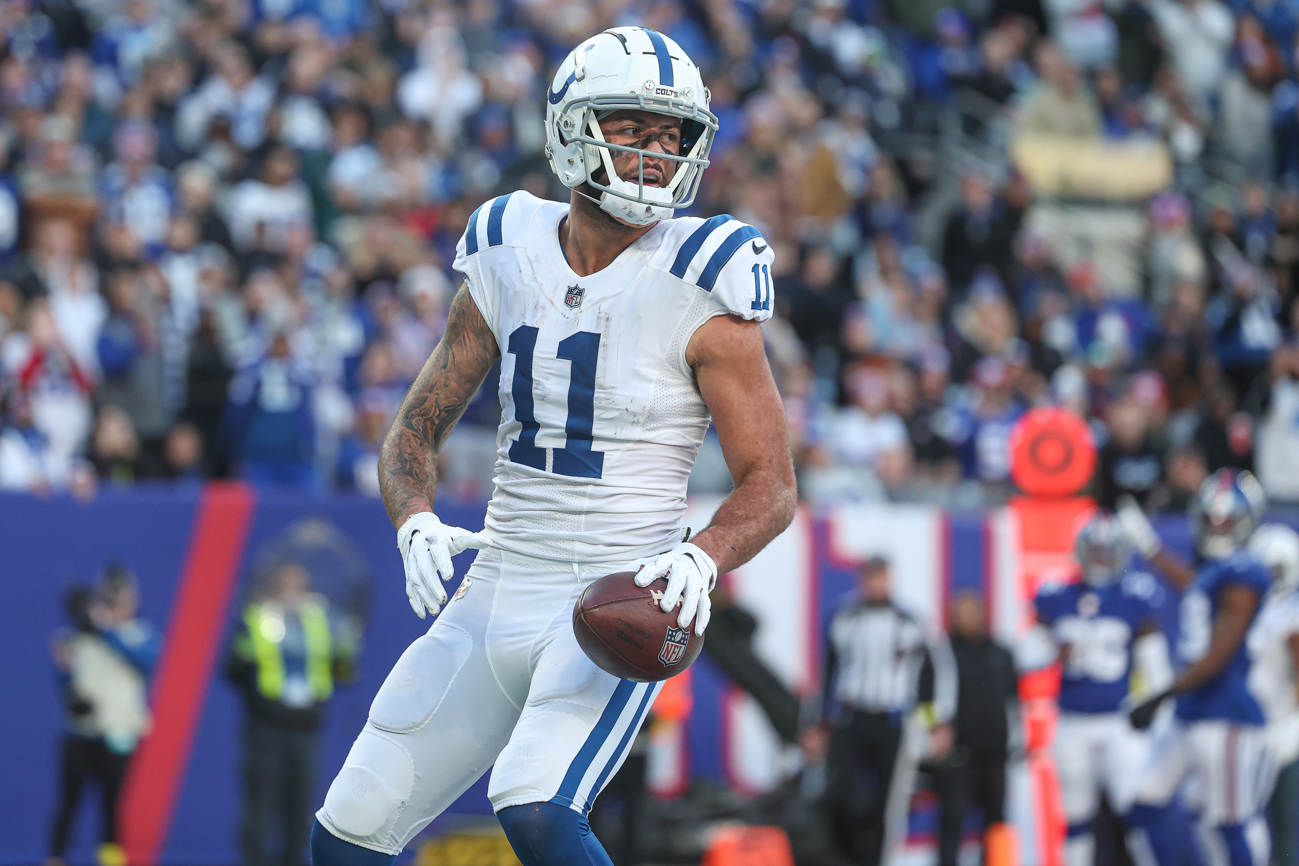 Indianapolis Colts wide receiver Michael Pittman Jr. (11) celebrates his touchdown reception during the second half against the New York Giants at MetLife Stadium