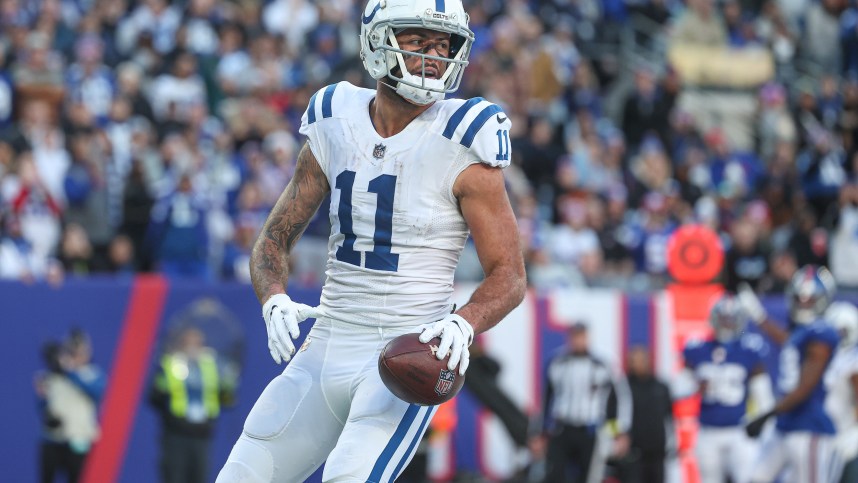 Indianapolis Colts wide receiver Michael Pittman Jr. (11) celebrates his touchdown reception during the second half against the New York Giants at MetLife Stadium