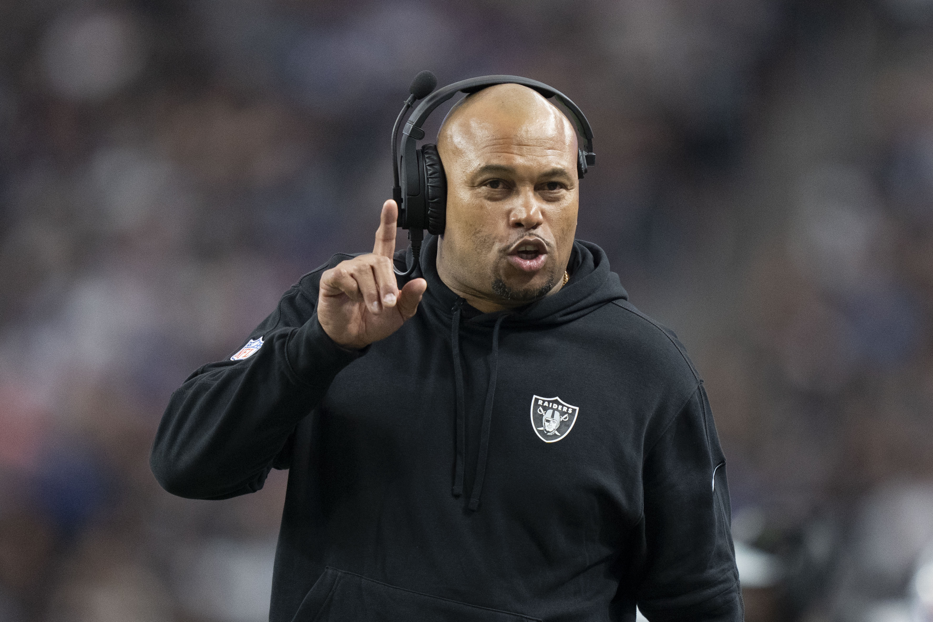 Las Vegas Raiders interim head coach Antonio Pierce signals against the New York Giants during the second quarter at Allegiant Stadium