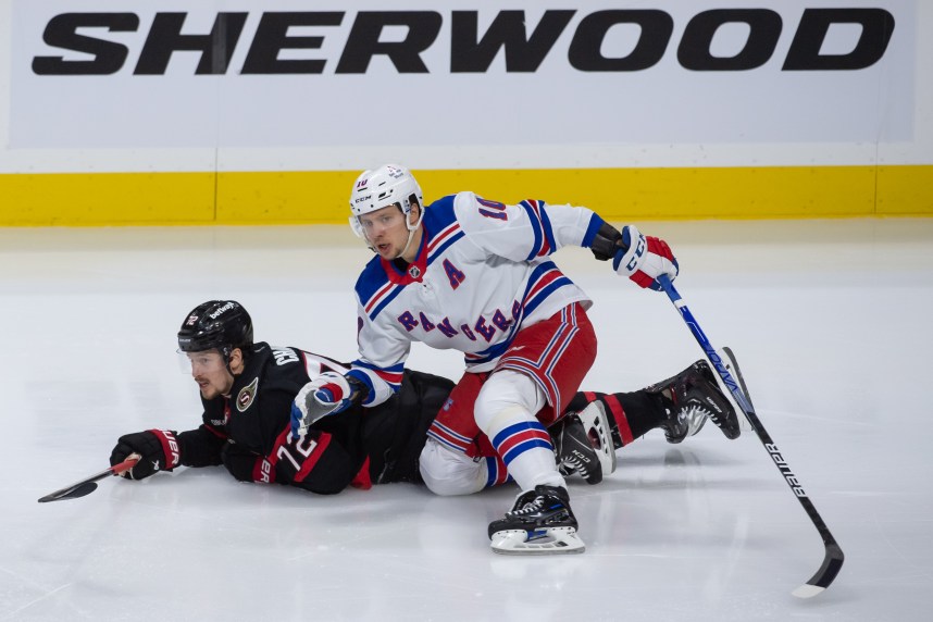 Ottawa Senators defenseman Thomas Chabot (72) collides with New York Rangers left wing Artemi Panarin (10) in the third period at the Canadian Tire Centre