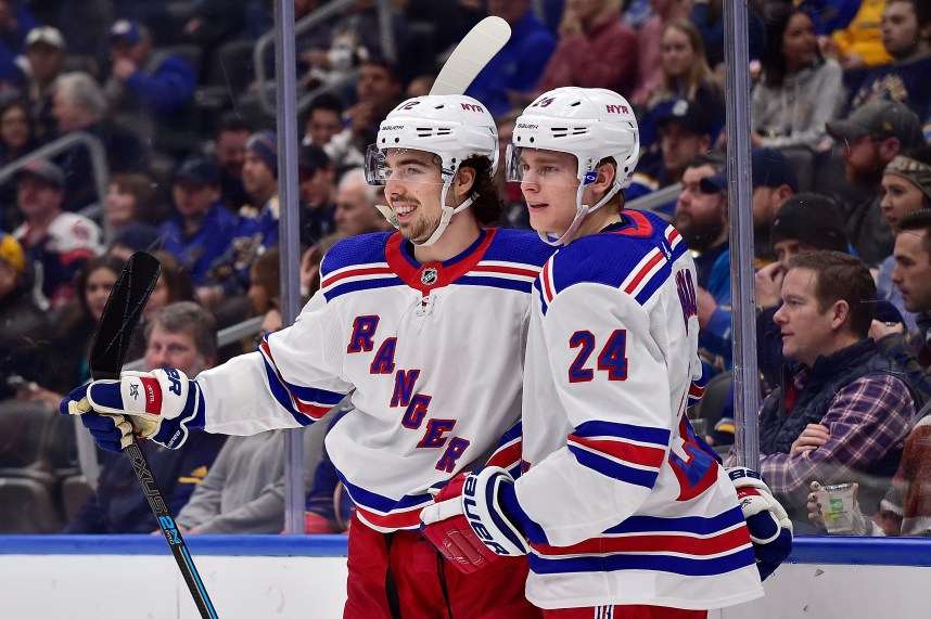 New York Rangers center Filip Chytil (72) is congratulated by right wing Kaapo Kakko (24) after scoring during the first period against the St. Louis Blues at Enterprise Center