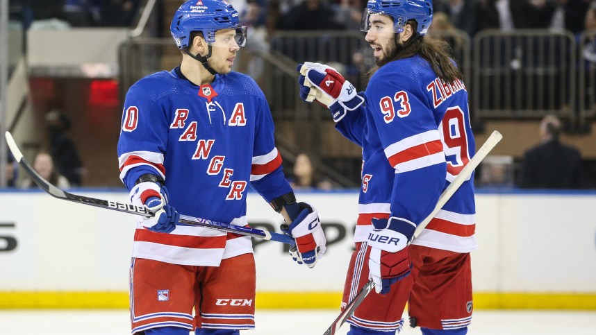 New York Rangers left wing Artemi Panarin (10) and center Mika Zibanejad (93) talk at the start of the game against the Vancouver Canucks at Madison Square Garden