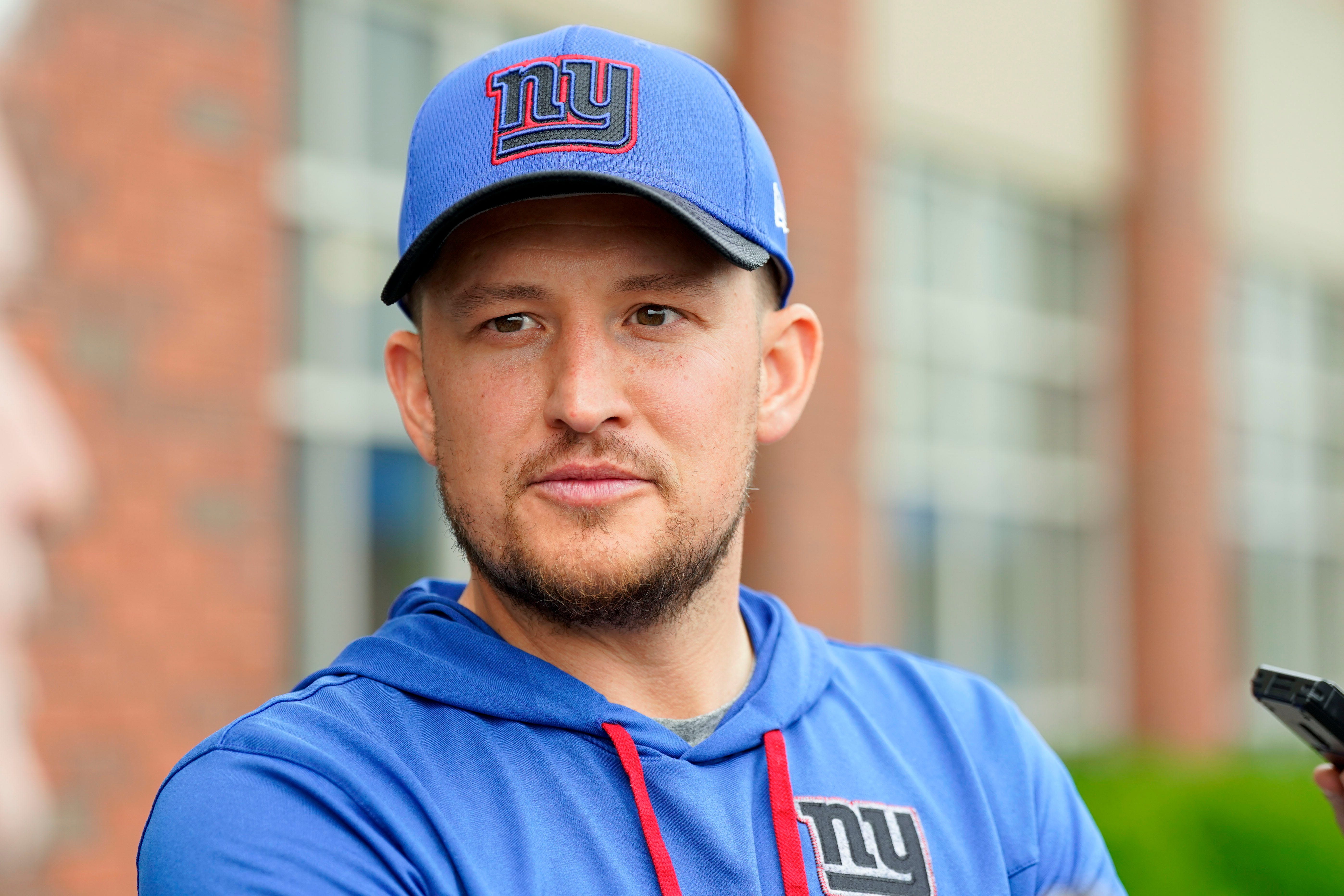 New York Giants quarterbacks coach Shea Tierney talks to reporters on day two of mandatory minicamp at the Giants training center