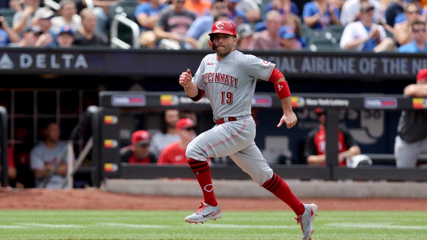 Cincinnati Reds first baseman Joey Votto (19) scores on a sacrifice fly by left fielder Jake Fraley (not pictured) during the fourth inning against the New York Mets at Citi Field
