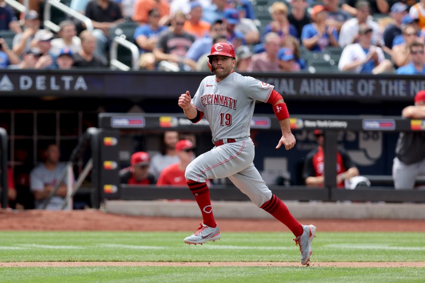 Cincinnati Reds first baseman Joey Votto (19) scores on a sacrifice fly by left fielder Jake Fraley (not pictured) during the fourth inning against the New York Mets at Citi Field