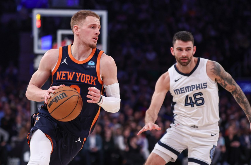 New York Knicks guard Donte DiVincenzo (0) dribbles in front of Memphis Grizzlies guard John Konchar (46) during the first half at Madison Square Garden
