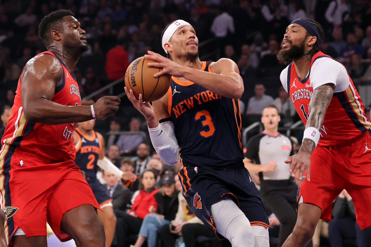 New York Knicks guard Josh Hart (3) drives to the basket against New Orleans Pelicans forwards Zion Williamson (1) and Brandon Ingram (14) during the first quarter at Madison Square Garden