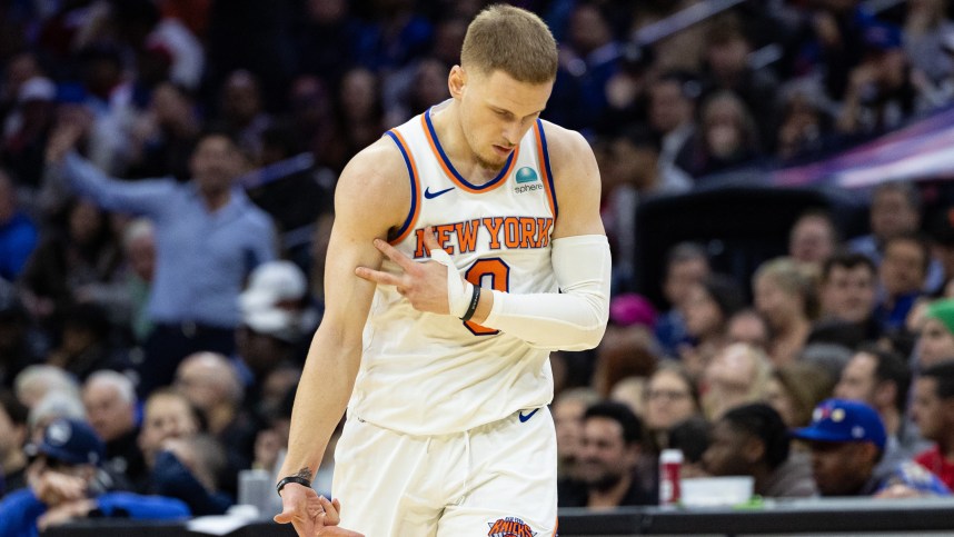 New York Knicks guard Donte DiVincenzo (0) reacts after his three pointer against the Philadelphia 76ers during the fourth quarter at Wells Fargo Center