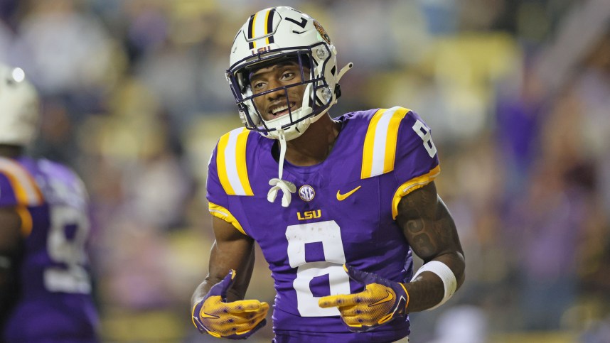 LSU Tigers wide receiver Malik Nabers (8) celebrates his 40-yard touchdown catch in the fourth quarter against the Georgia State Panthers at Tiger Stadium
