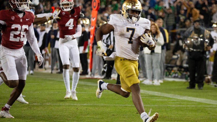 Notre Dame Fighting Irish running back Audric Estime (New York Giants draft prospect) (7) breaks free for another touchdown run against the Stanford Cardinal during the third quarter at Stanford Stadium
