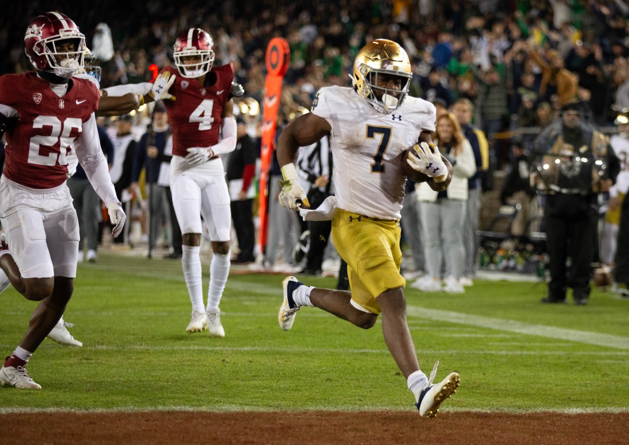 Notre Dame Fighting Irish running back Audric Estime (New York Giants draft prospect) (7) breaks free for another touchdown run against the Stanford Cardinal during the third quarter at Stanford Stadium