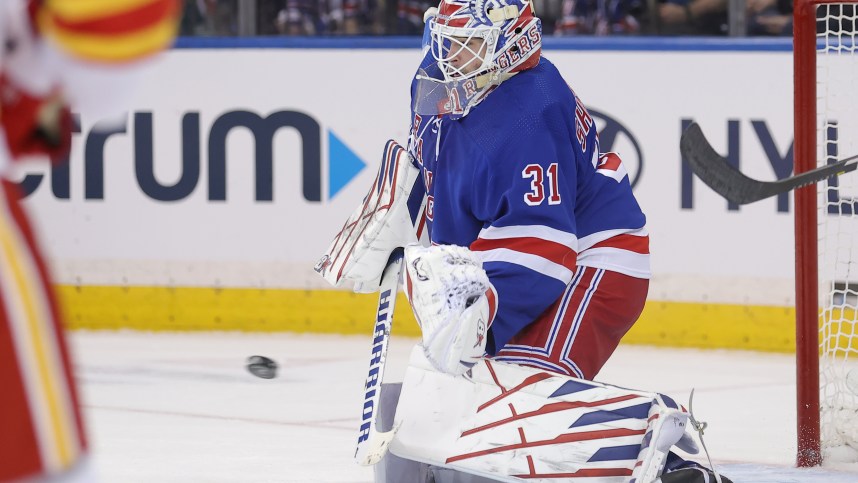 New York Rangers goaltender Igor Shesterkin (31) makes a save against the Calgary Flames during the second period at Madison Square Garden