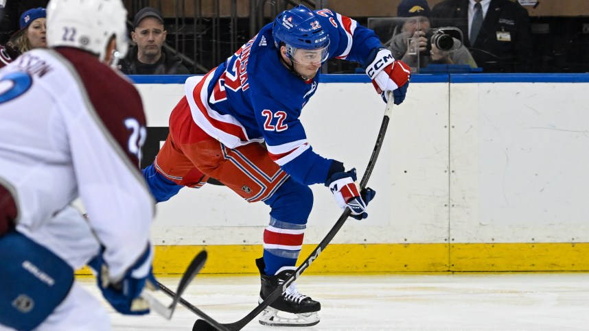 New York Rangers center Jonny Brodzinski (22) attempts a shot against the Colorado Avalanche during the first period at Madison Square Garden
