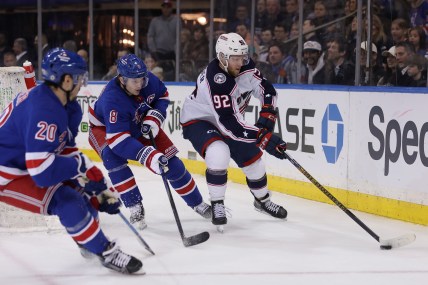 Columbus Blue Jackets left wing Alexander Nylander (92) controls the puck against New York Rangers defenseman Jacob Trouba (8) and left wing Chris Kreider (20) during the third period at Madison Square Garden