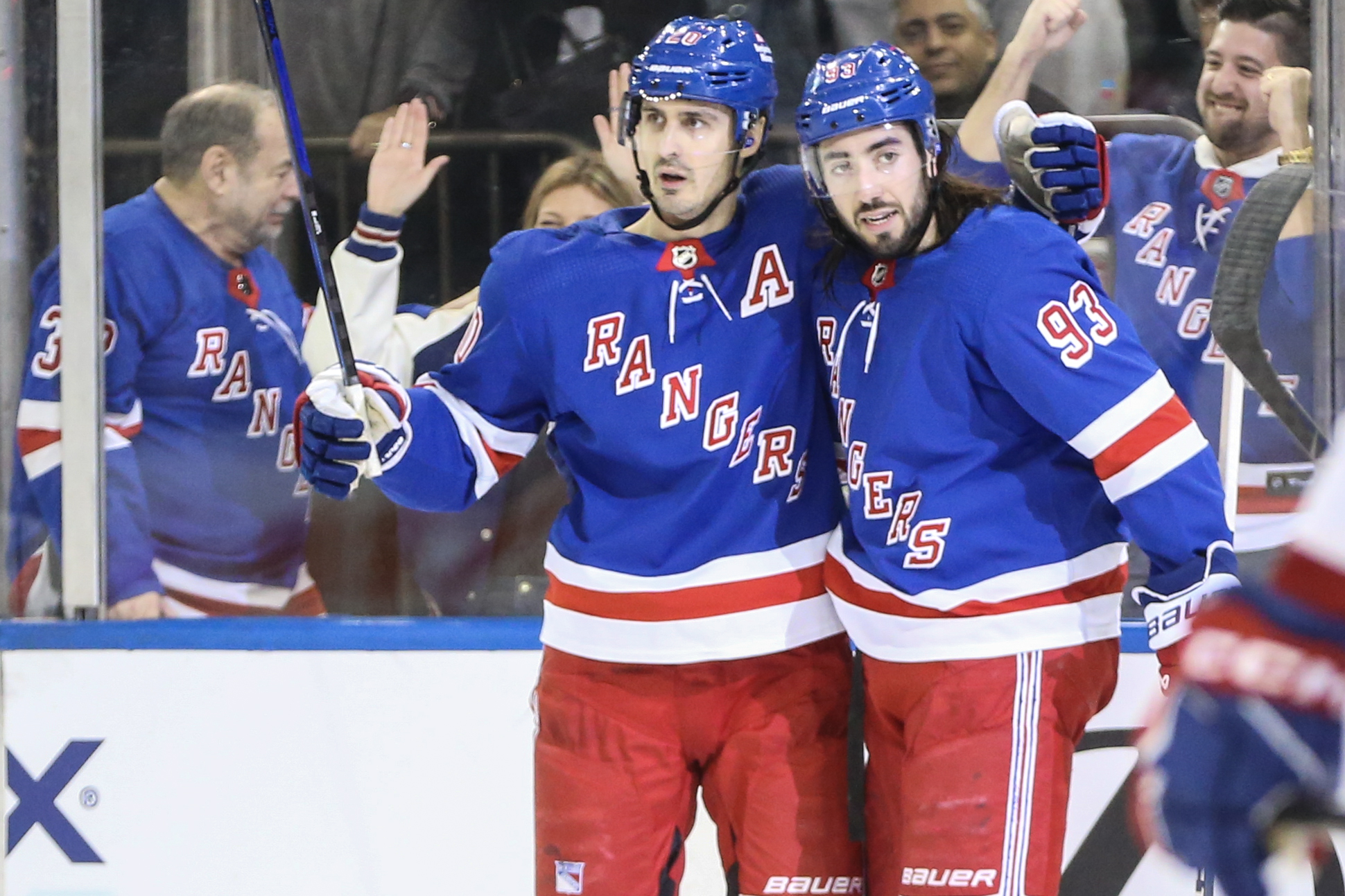 New York Rangers left wing Chris Kreider (20) celebrates with center Mika Zibanejad (93) after scoring a goal in the second period against the Montreal Canadiens at Madison Square Garden
