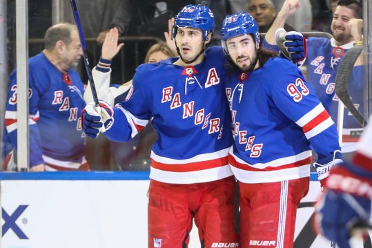 New York Rangers left wing Chris Kreider (20) celebrates with center Mika Zibanejad (93) after scoring a goal in the second period against the Montreal Canadiens at Madison Square Garden