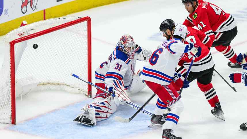 Chicago Blackhawks left wing Nick Foligno (17) scores past New York Rangers goaltender Igor Shesterkin (31) during the third period at the United Center