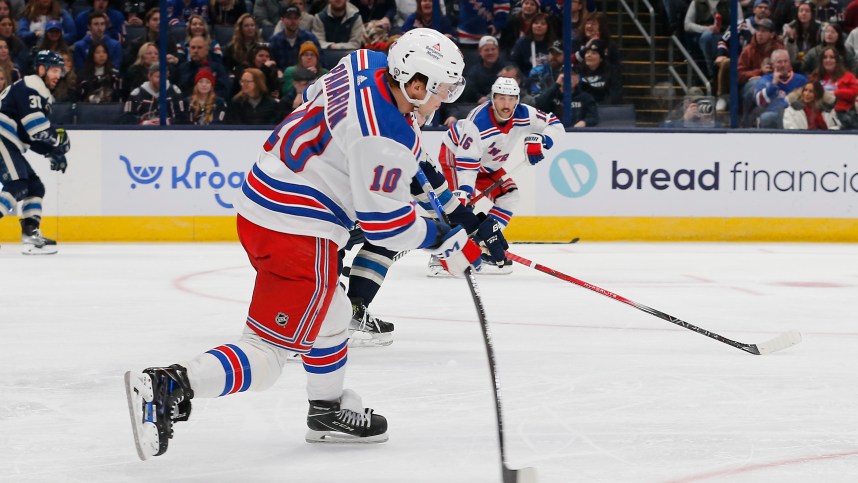 New York Rangers left wing Artemi Panarin (10) wrists a shot on goal against the Columbus Blue Jackets during the second period at Nationwide Arena