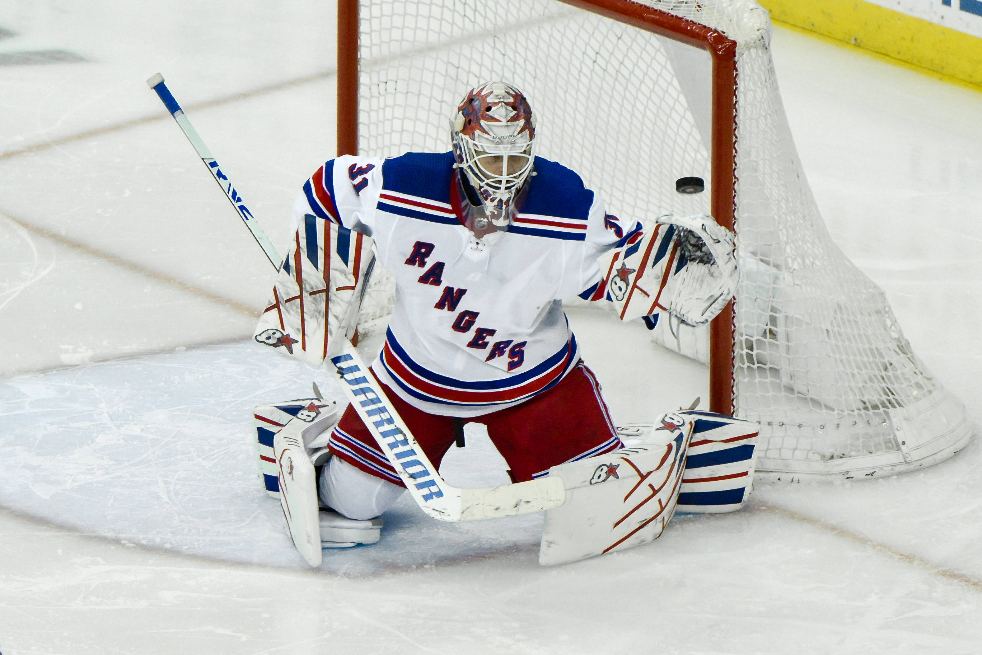 New York Rangers goaltender Igor Shesterkin (31) makes a save against the New Jersey Devils during the third period at Prudential Center