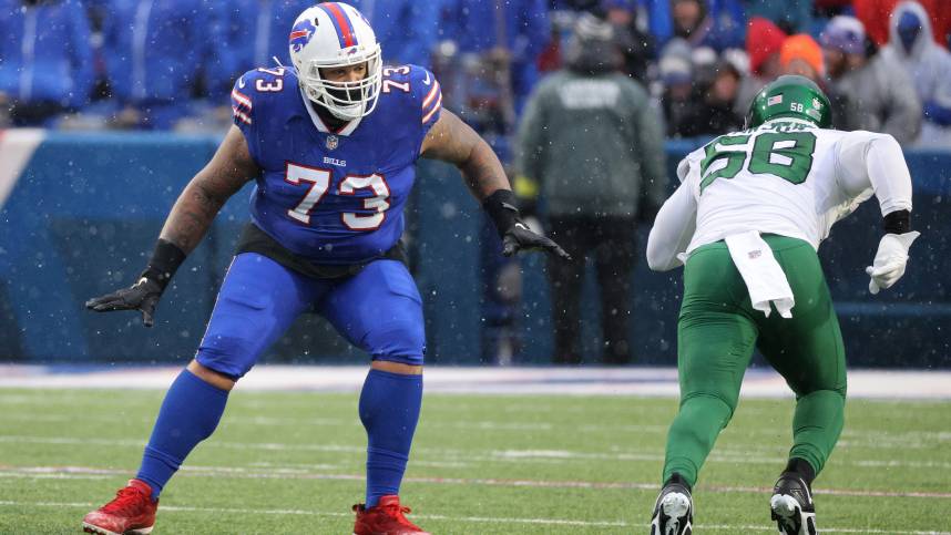 Bills Dion Dawkins drops back to pass block against Jets Carl Lawson.