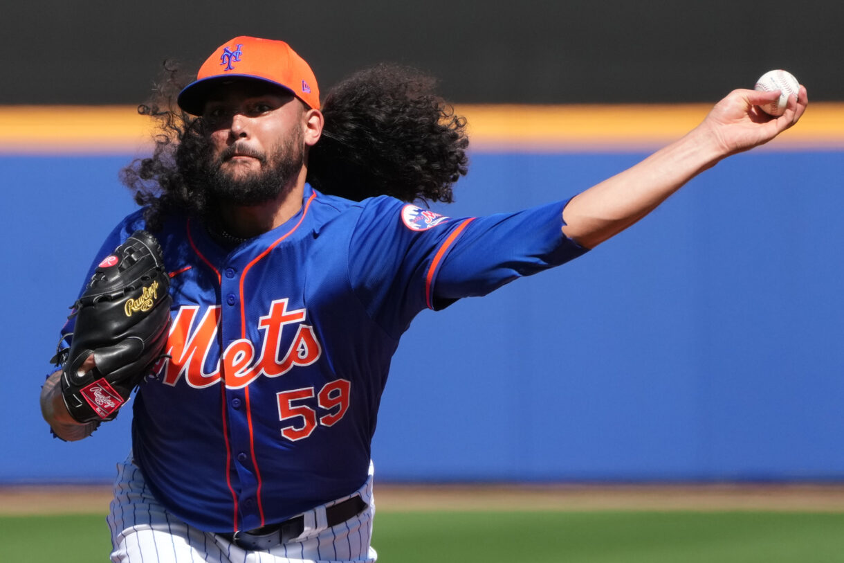 New York Mets relief pitcher Sean Manaea (59) throws batting practice during workouts at spring training