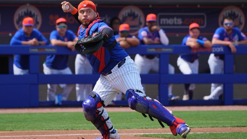 New York Mets catcher Francisco Alvarez (4) picks up a bunt and throws out Detroit Tigers centerfielder Parker Meadows in the fourth inning at Clover Park