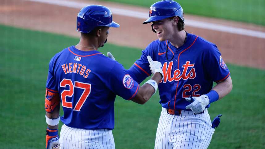 New York Mets third baseman Brett Baty (22) celebrates with New York Mets third baseman Mark Vientos (27) after hitting a home run against the St. Louis Cardinals during the second inning at Clover Park