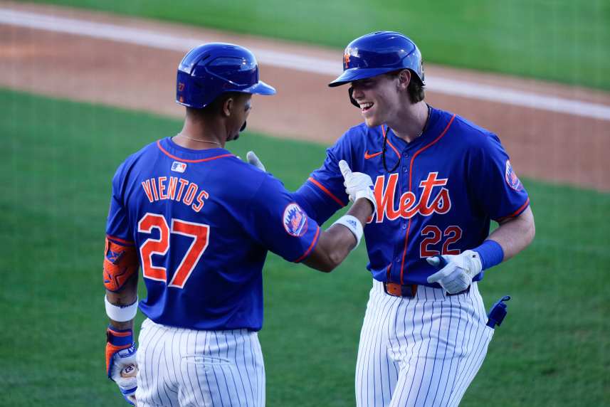 New York Mets third baseman Brett Baty (22) celebrates with New York Mets third baseman Mark Vientos (27) after hitting a home run against the St. Louis Cardinals during the second inning at Clover Park
