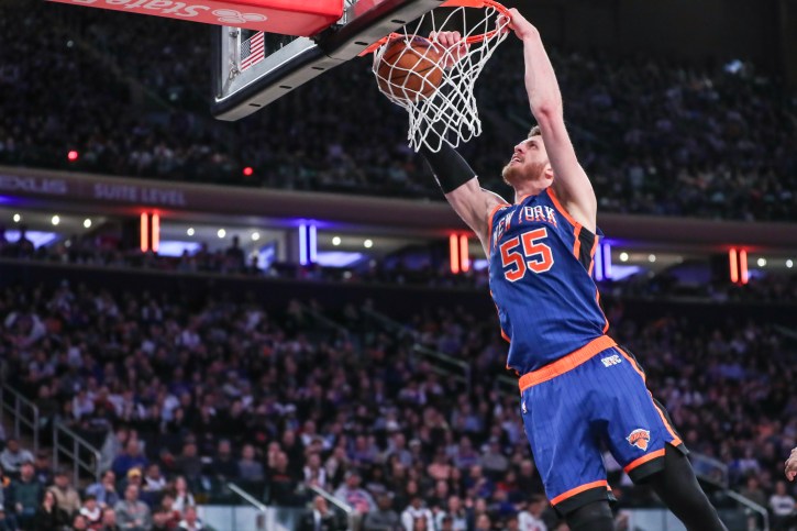 New York Knicks center Isaiah Hartenstein (55) dunks in the fourth quarter against the Brooklyn Nets at Madison Square Garden