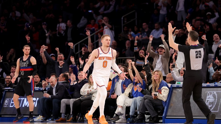New York Knicks guard Donte DiVincenzo (0) celebrates his three point shot against the Detroit Pistons during the fourth quarter at Madison Square Garden