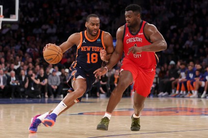 New York Knicks guard Alec Burks (18) drives to the basket against New Orleans Pelicans forward Zion Williamson (1) during the second quarter at Madison Square Garden