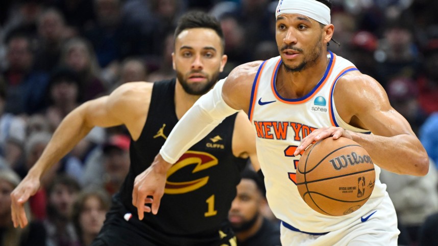 New York Knicks guard Josh Hart (3) dribbles beside Cleveland Cavaliers guard Max Strus (1) in the second quarter at Rocket Mortgage FieldHouse