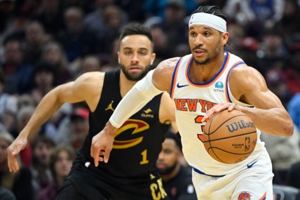 New York Knicks guard Josh Hart (3) dribbles beside Cleveland Cavaliers guard Max Strus (1) in the second quarter at Rocket Mortgage FieldHouse