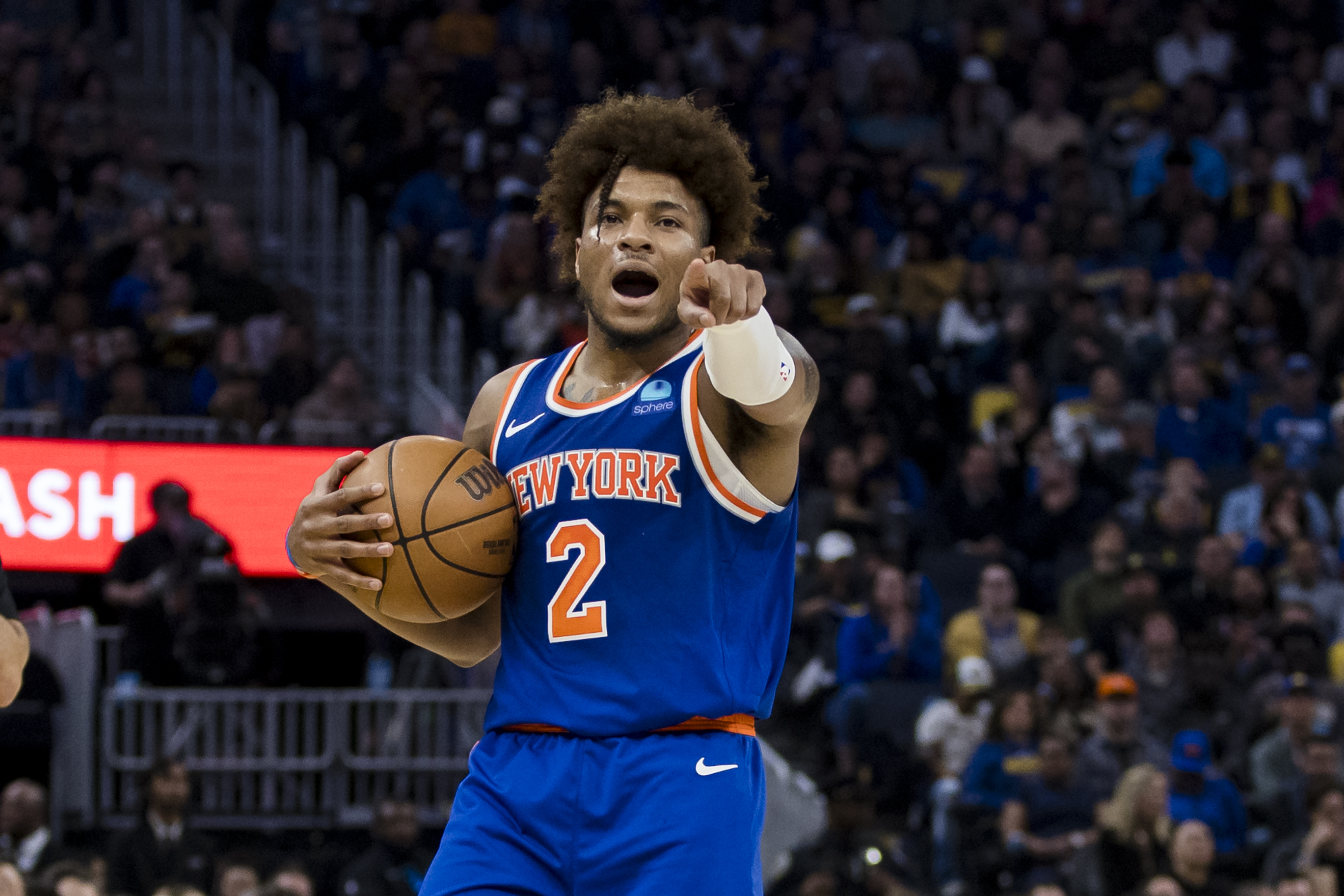 New York Knicks guard Miles McBride (2) gestures during the first half of the game against the Golden State Warriors at Chase Center