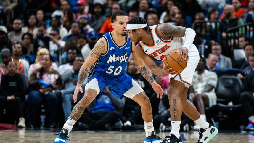 New York Knicks guard Josh Hart (3) dribbles the ball against the Orlando Magic guard Cole Anthony (50) in the fourth quarter at KIA Center. Mandatory Credit