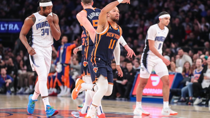 New York Knicks guard Jalen Brunson (11) gestured after making a three point shot in the first quarter against the Orlando Magic at Madison Square Garden