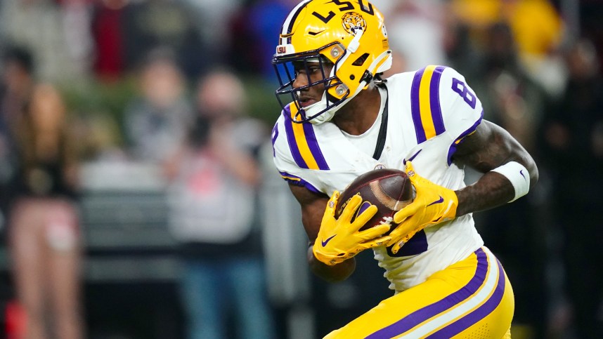 LSU Tigers wide receiver Malik Nabers (8) (New York Giants draft target) hauls in a 46 yard pass for a touchdown against the Alabama Crimson Tide during the first quarter at Bryant-Denny Stadium.