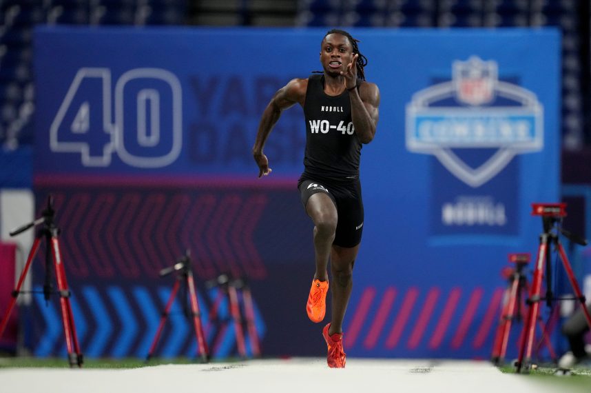 Texas wide receiver Xavier Worthy (New York Giants draft prospect) (WO40) ran an official time of 4.21 seconds to set a combine record during the 2024 NFL Combine at Lucas Oil Stadium.