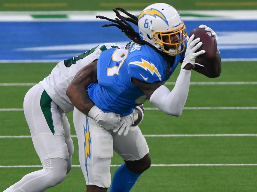 Los Angeles Chargers wide receiver Mike Williams (81) catches a pass against New York Jets cornerback Arthur Maulet (23) during the third quarter at SoFi Stadium