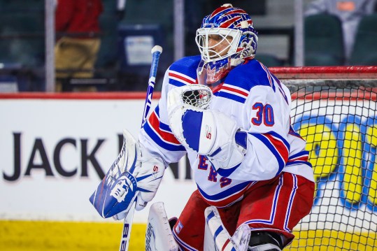 New York Rangers goaltender Henrik Lundqvist (30) guards his net during the warmup period before a game against the Calgary Flames at Scotiabank Saddledome