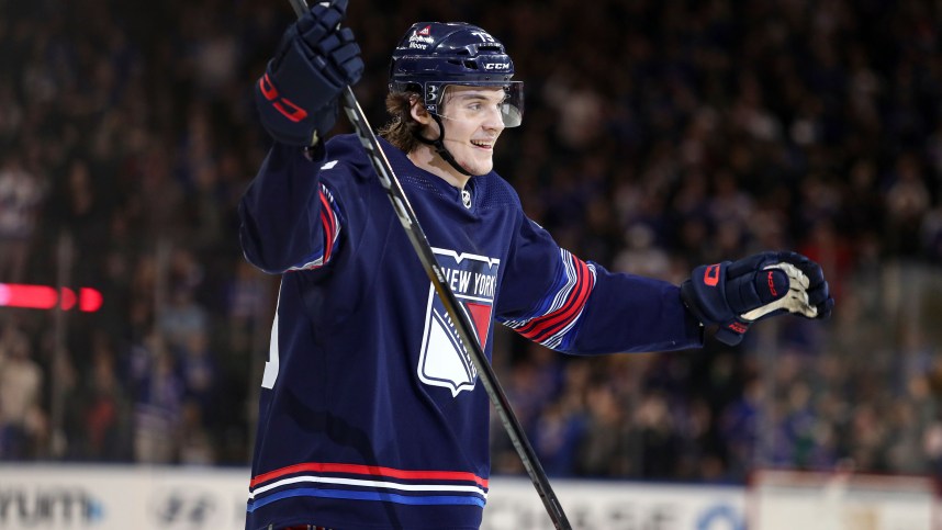 New York Rangers center Matt Rempe (73) celebrates a goal that was later overturned by replay during the second period against the St. Louis Blues at Madison Square Garden