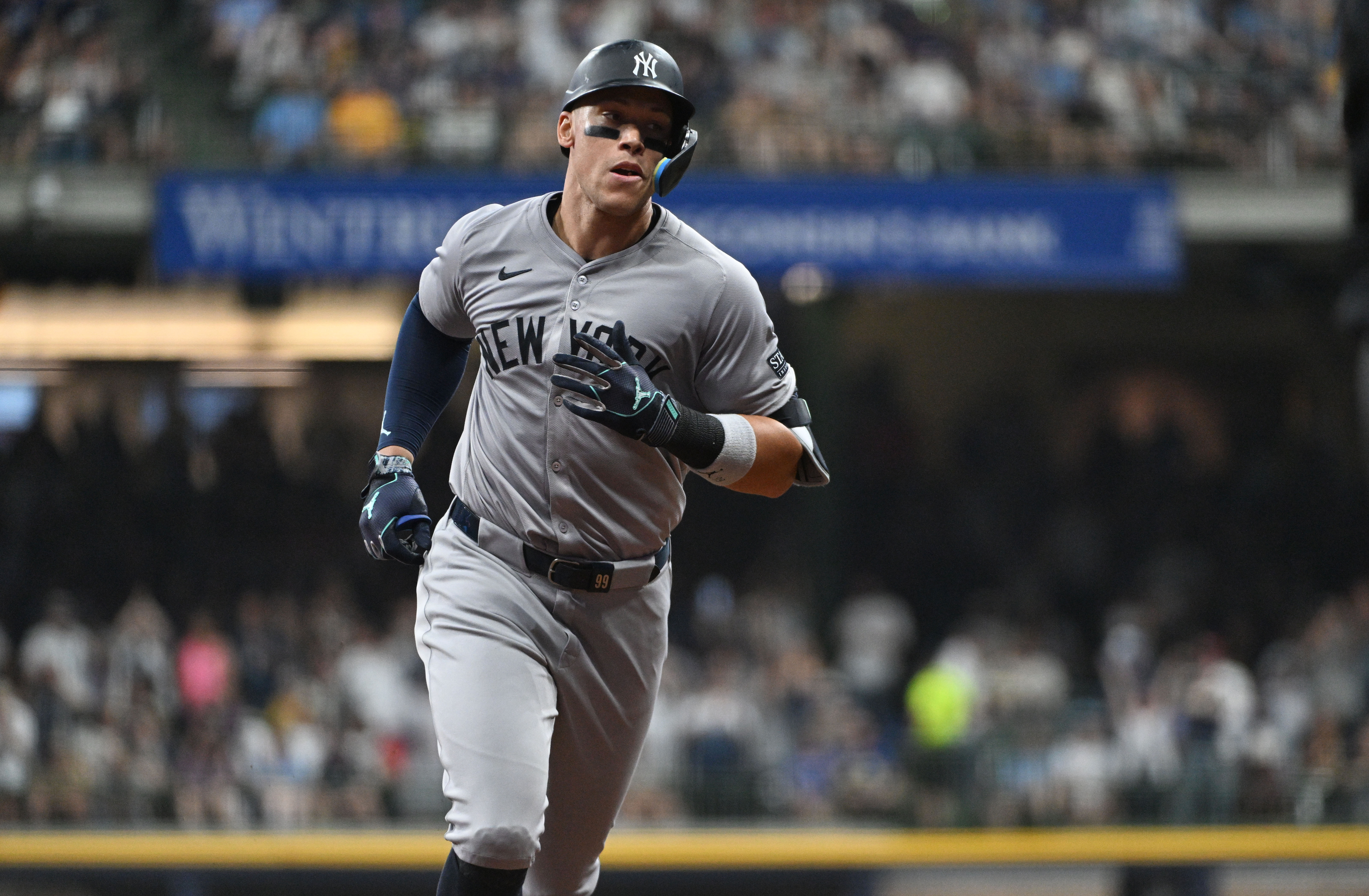 Apr 27, 2024; Milwaukee, Wisconsin, USA; New York Yankees outfielder Aaron Judge (99) rounds the bases after hitting home run against Milwaukee Brewers in the sixth inning at American Family Field. Mandatory Credit: Michael McLoone-USA TODAY Sports