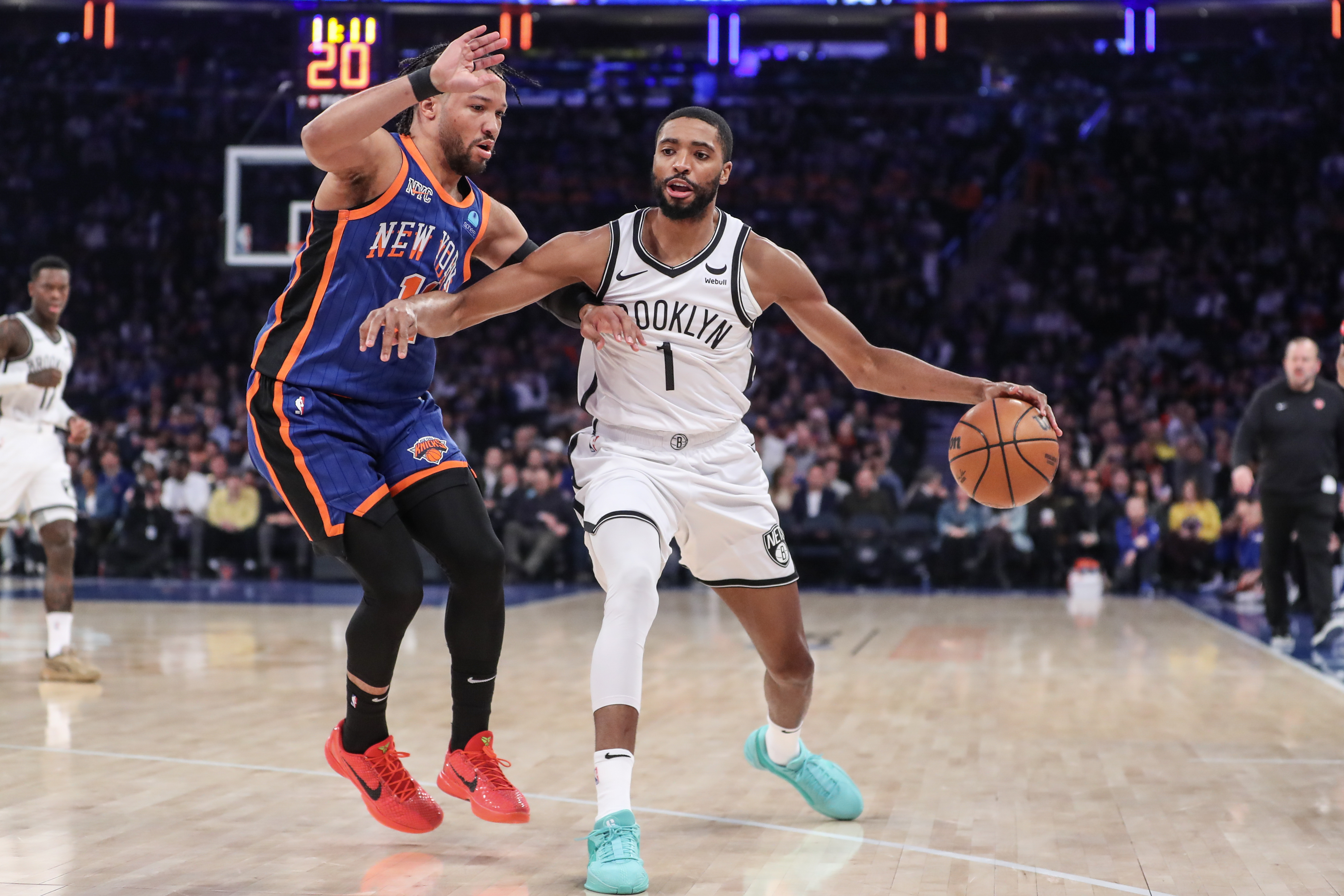 Brooklyn Nets forward Mikal Bridges (1) looks to drive past New York Knicks guard Jalen Brunson (11) in the first quarter at Madison Square Garden