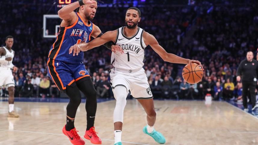 Brooklyn Nets forward Mikal Bridges (1) looks to drive past New York Knicks guard Jalen Brunson (11) in the first quarter at Madison Square Garden